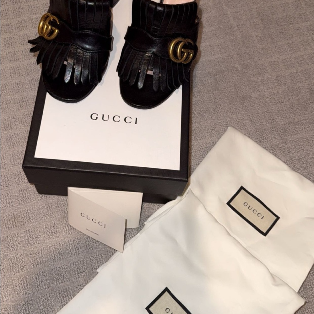 Gucci Black Leather Loafers with Gold Accent